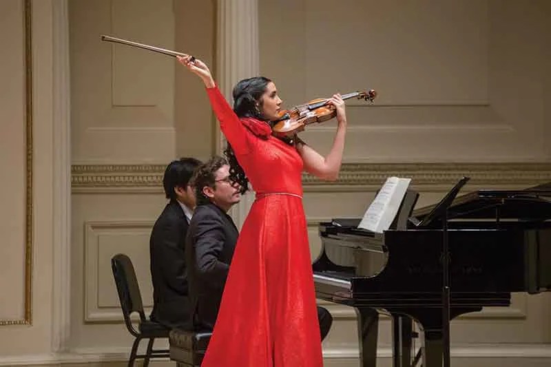 Aisha Syed's violin debut at Carnegie Hall included compositions by Manuel de Falla arranged by Fritz Kreisler, Bach, Ravel, Sarasate, and Franckl