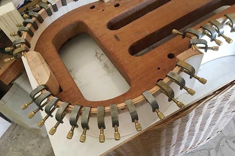 Cello in clamps during construction
