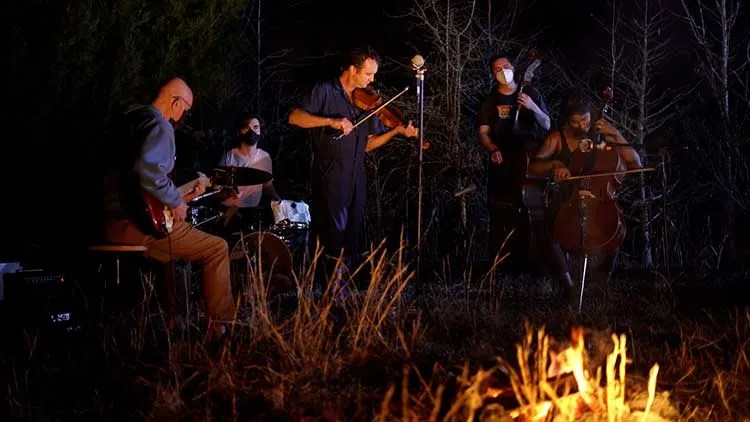 Michot's Melody Makers recording the album Tiny Island outdoors