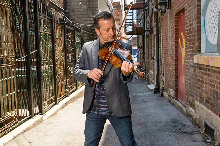 Del McCoury Band Fiddler Jason Carter Shines on His Long-Awaited