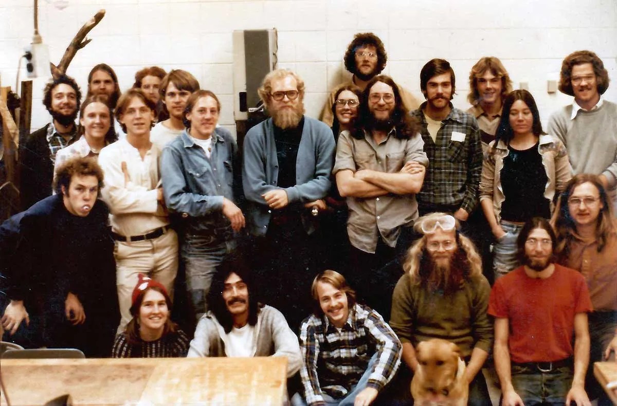 Larry Frye (center with blue sweater and glasses) and string instrument repair students, 1976, Courtesy of Minnesota State College Southeast