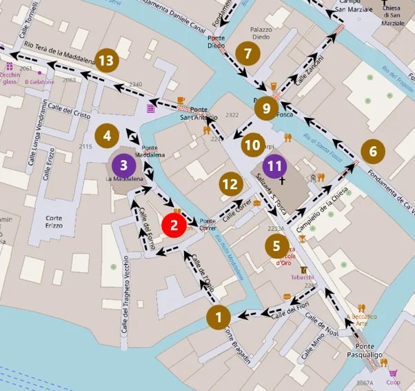 Map with a dotted path and 12 numbered stops guiding a walking route through a canal-side urban area.