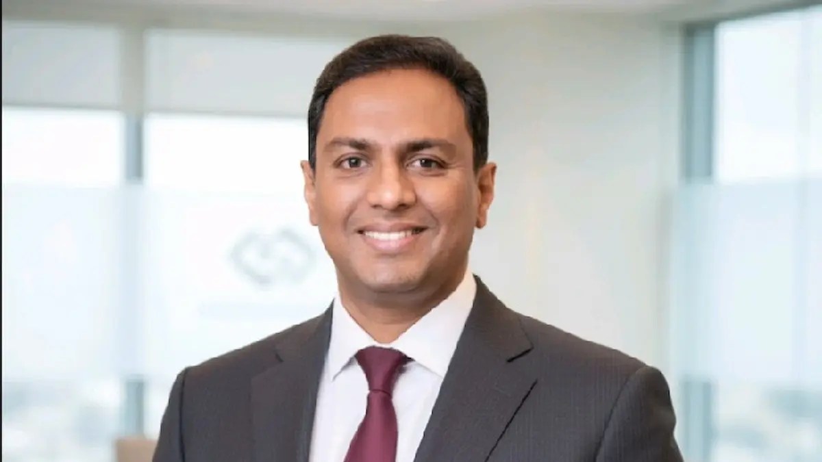 Abraham Samuel Raju, chief operating officer of Thumbay University Hospital, Dubai, in a formal business portrait.