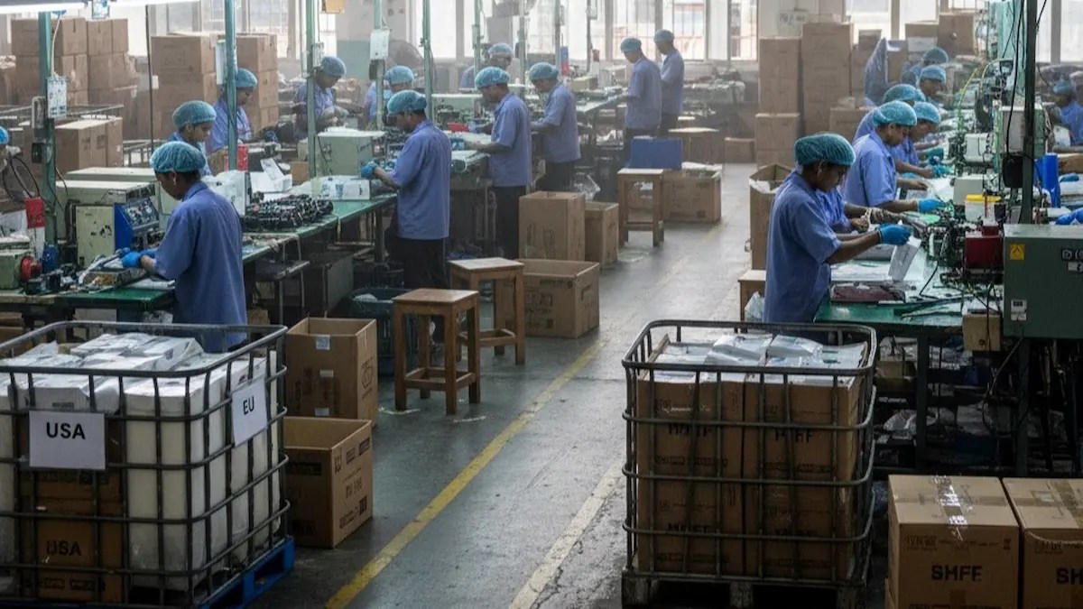 Indian factory workers packaging export goods as lower US tariffs support manufacturing growth and job creation in India