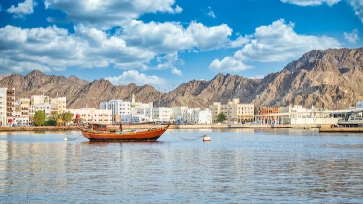 Traditional wooden dhow at Muscat Harbour, Oman, symbolizing the country's digital transformation and evolving AI-driven career opportunities for young professionals.