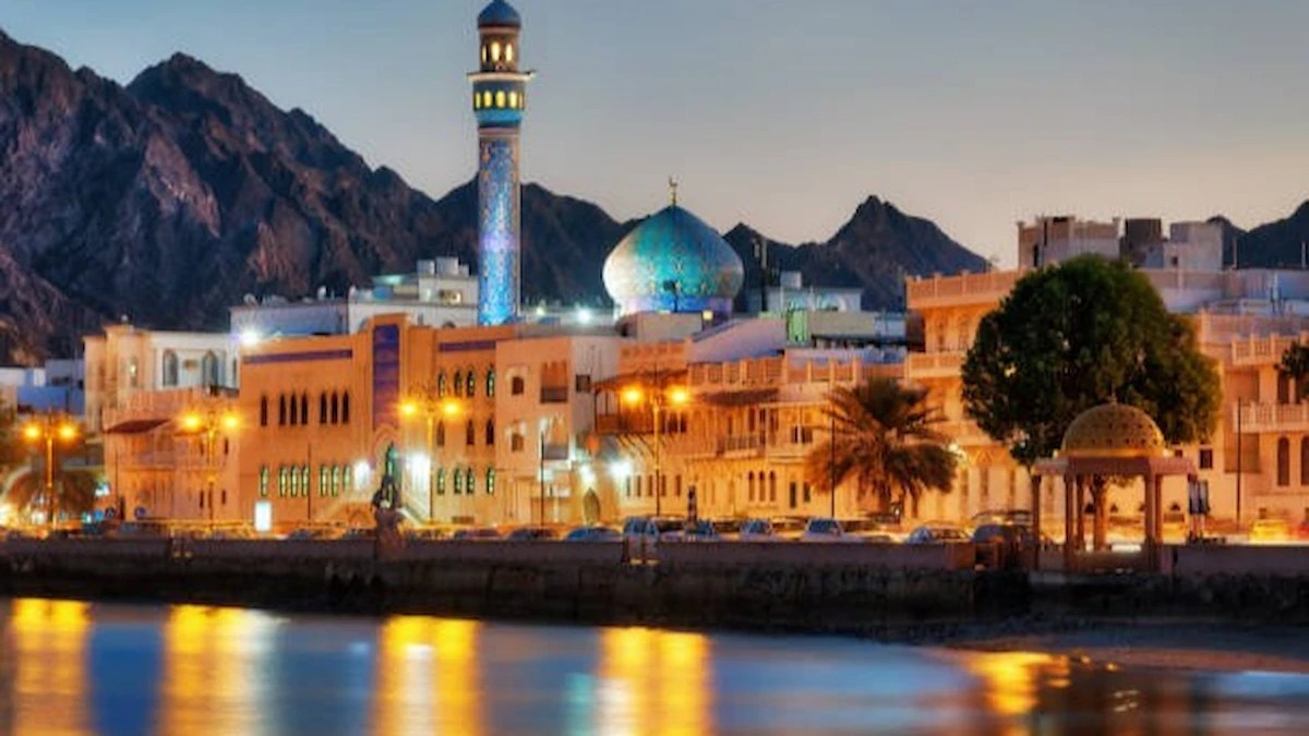 Muscat waterfront at dusk, representing Oman sustainable transport and the country's investment in youth training, electric vehicle technologies and green mobility.