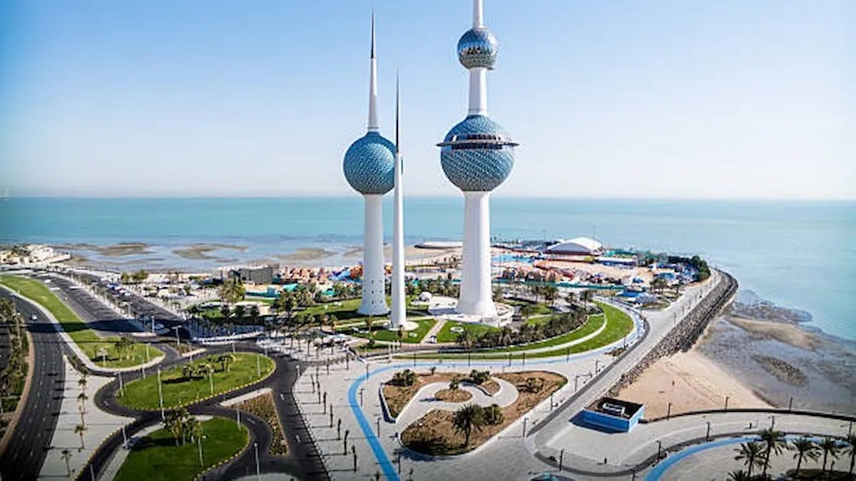 Kuwait Towers overlooking the Arabian Gulf, symbolizing Kuwait's commitment to worker safety and labor regulations following the end of the summer midday outdoor work ban.