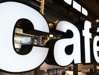 Illuminated channel letter storefront sign
