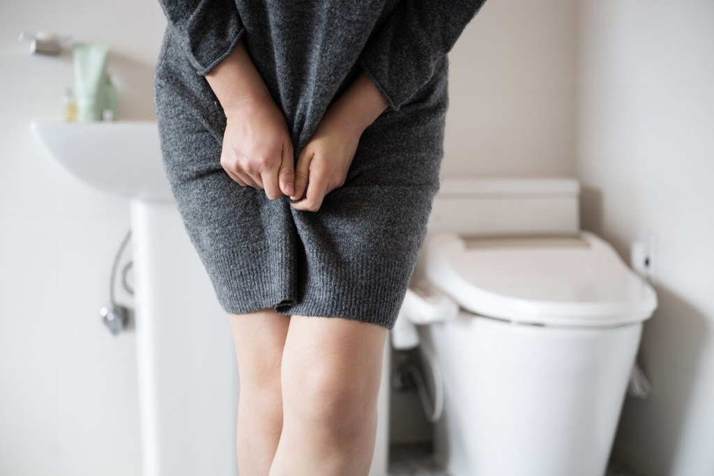 Donna con incontinenza urinaria
