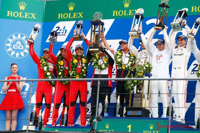 Porsche 919 Hybrids win Le Mans one-two: Porsche 919 drivers, one-two on 2015 Le Mans podium. Porsche Team: Timo Bernhard, Brendon Hartley, Mark Webber, Fritz Enzinger, Leiter LMP1, Nico Huelkenberg, Nick Tandy, Earl Bamber (l-r). Credit: Porsche AG