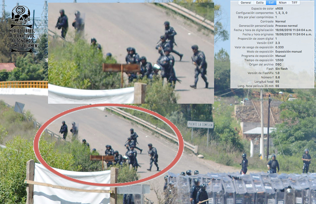 [Foto 5] 11:24:04 a.m. Se ve al policía estatal de Oaxaca, José Luis Lazo Sánchez empuñando un arma larga, a unos cuantos metros de el, en la parte baja, se ve a elementos de la gendarmería corriendo y posicionándose para disparar.