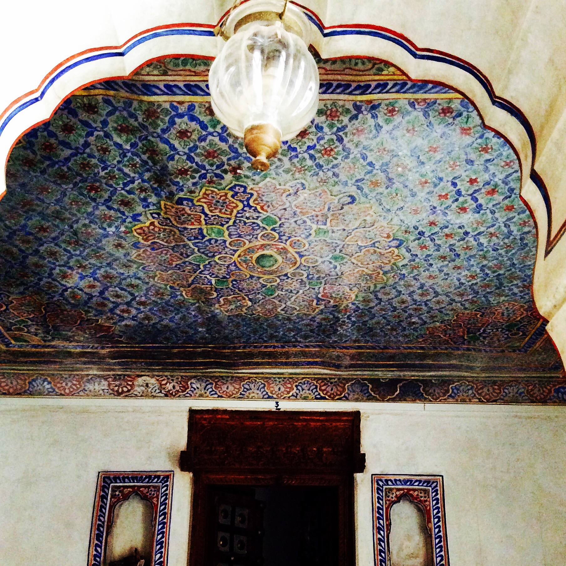 I can never look at plain ceilings without wondering what they might look like if painted like this. A ceiling at the Nadine Le Prince Haveli painted to look like a persian carpet