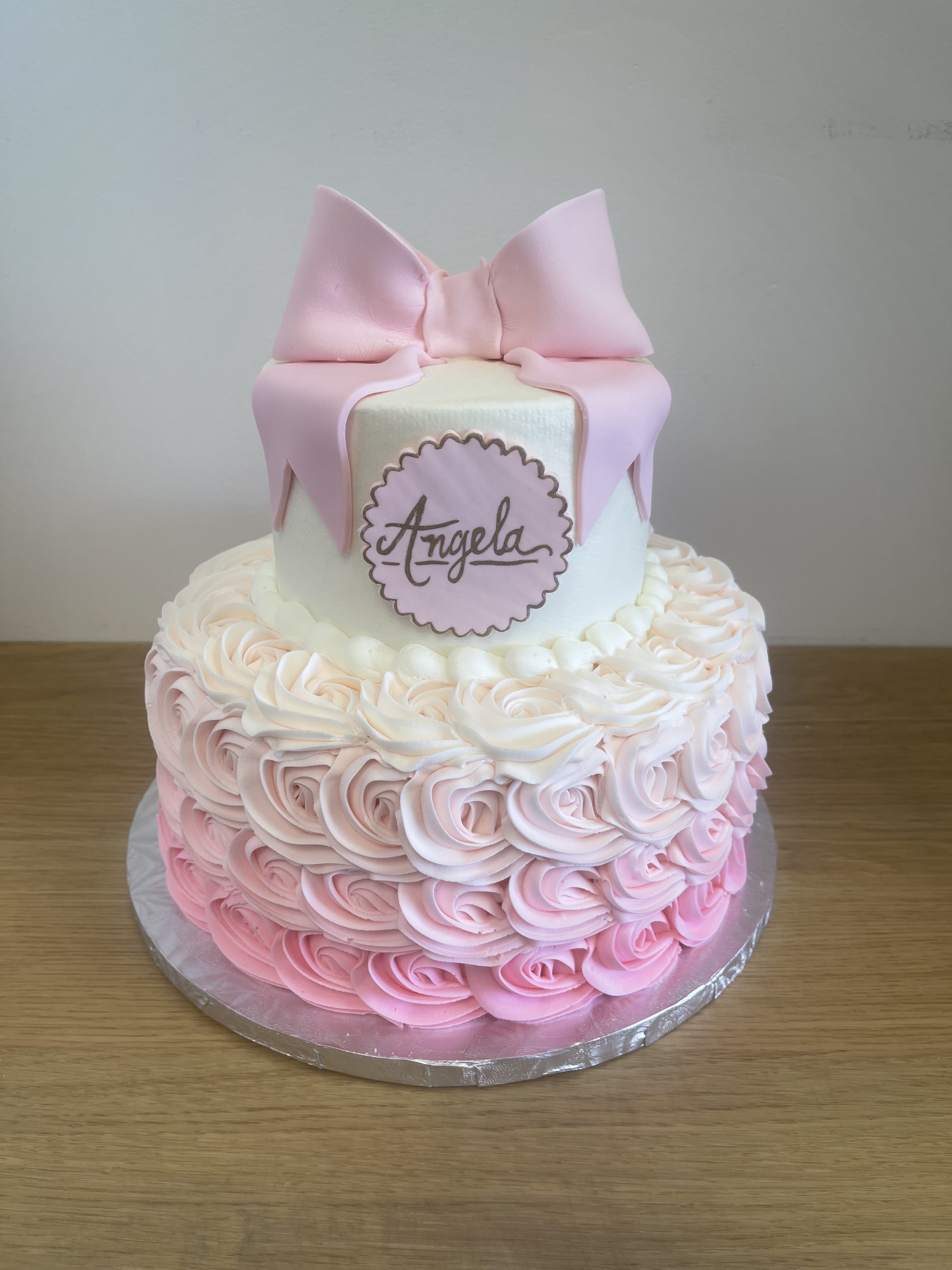 Pink rosettes with bow
