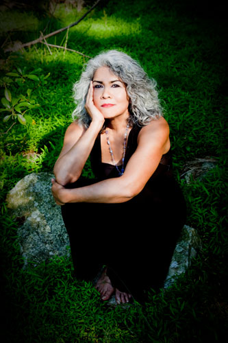 Sumi Tonooka chilling on a green hill