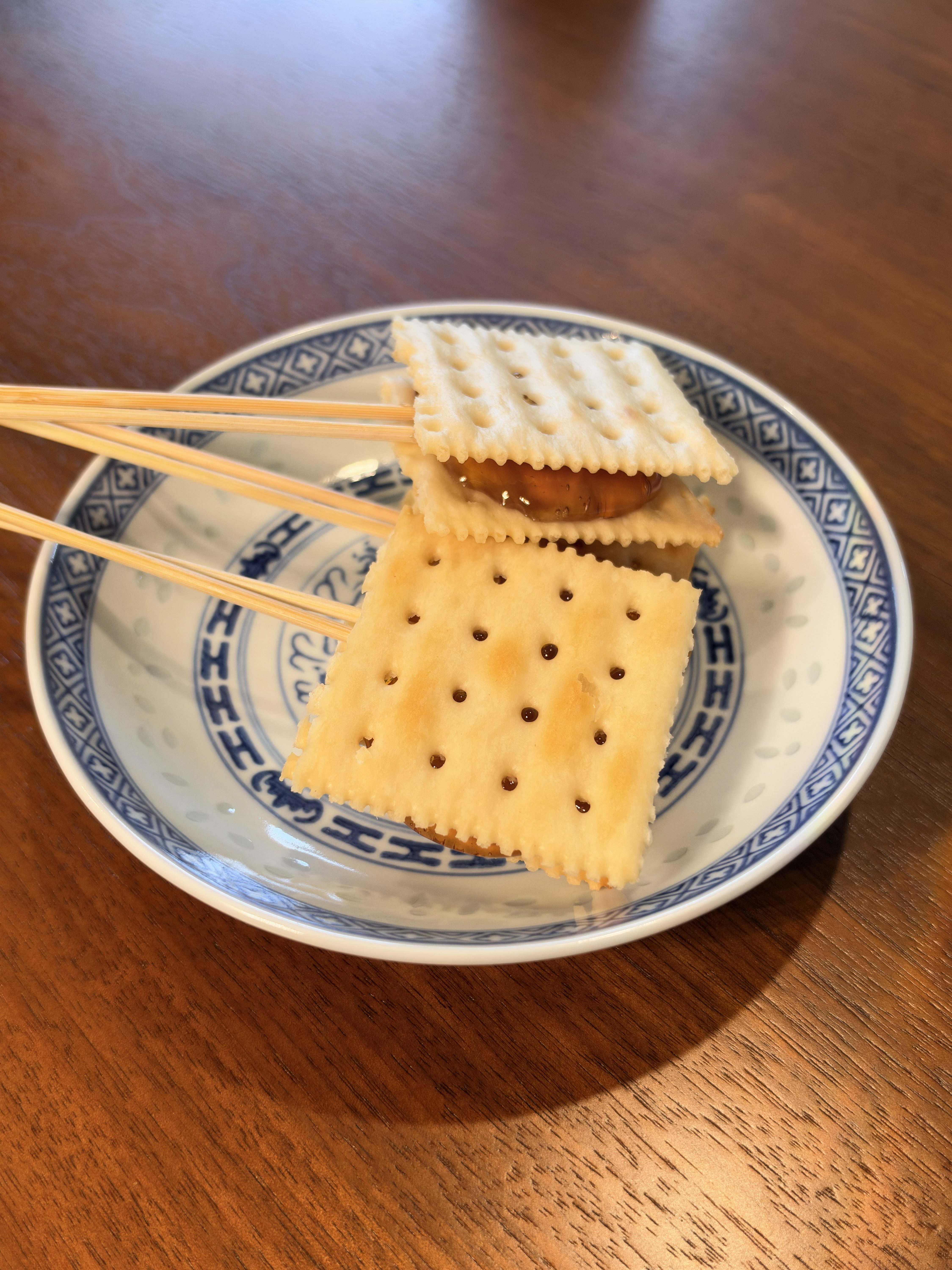 Maltose cracker sandwiches on a blue-and-white plate