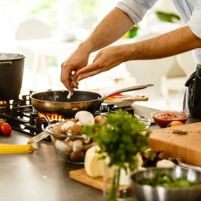 What Foods Have Creatine? Discovering Natural Sources to Eat for Muscle Building 21 Man Who is Cooking specifically to Get-Natural Creatine