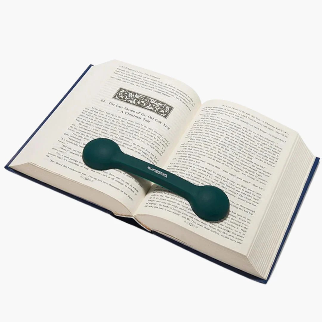 Superior Essentials weighted page holder on open book