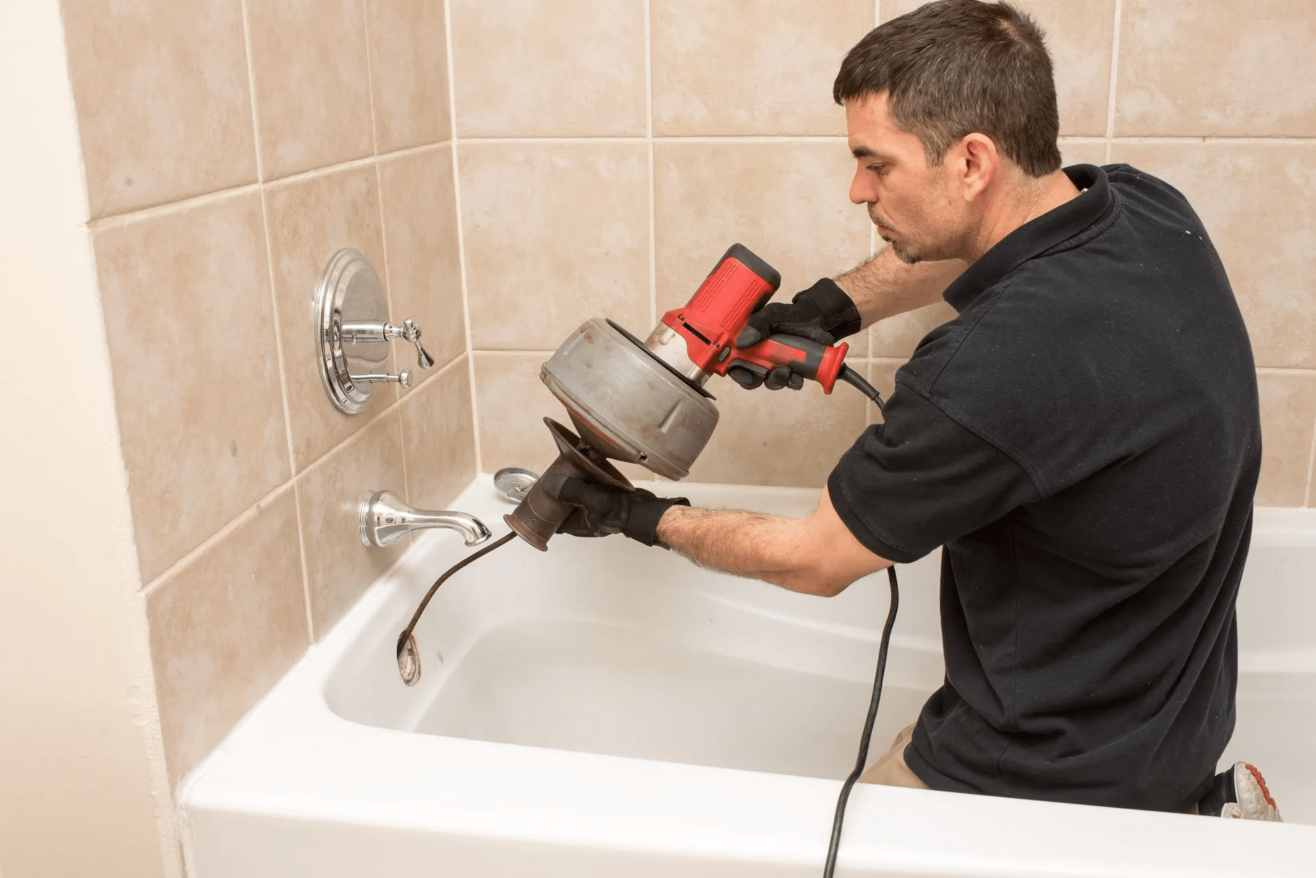 Unclogging-Drain3_Surefire-Septic