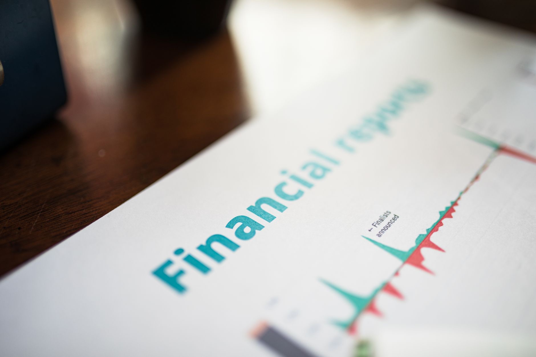Business executives and investors review corporate earnings data during a major U.S. reporting season.