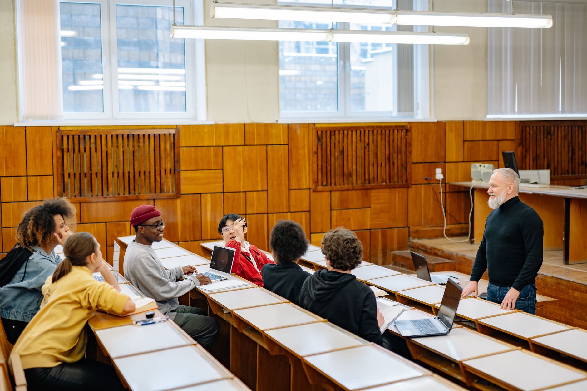Texas Weighs University Funding Formula Tied to Student Persistence and Graduate Earnings 3 Students walk across a Texas public university campus as state officials consider a performance-based higher-education funding formula.