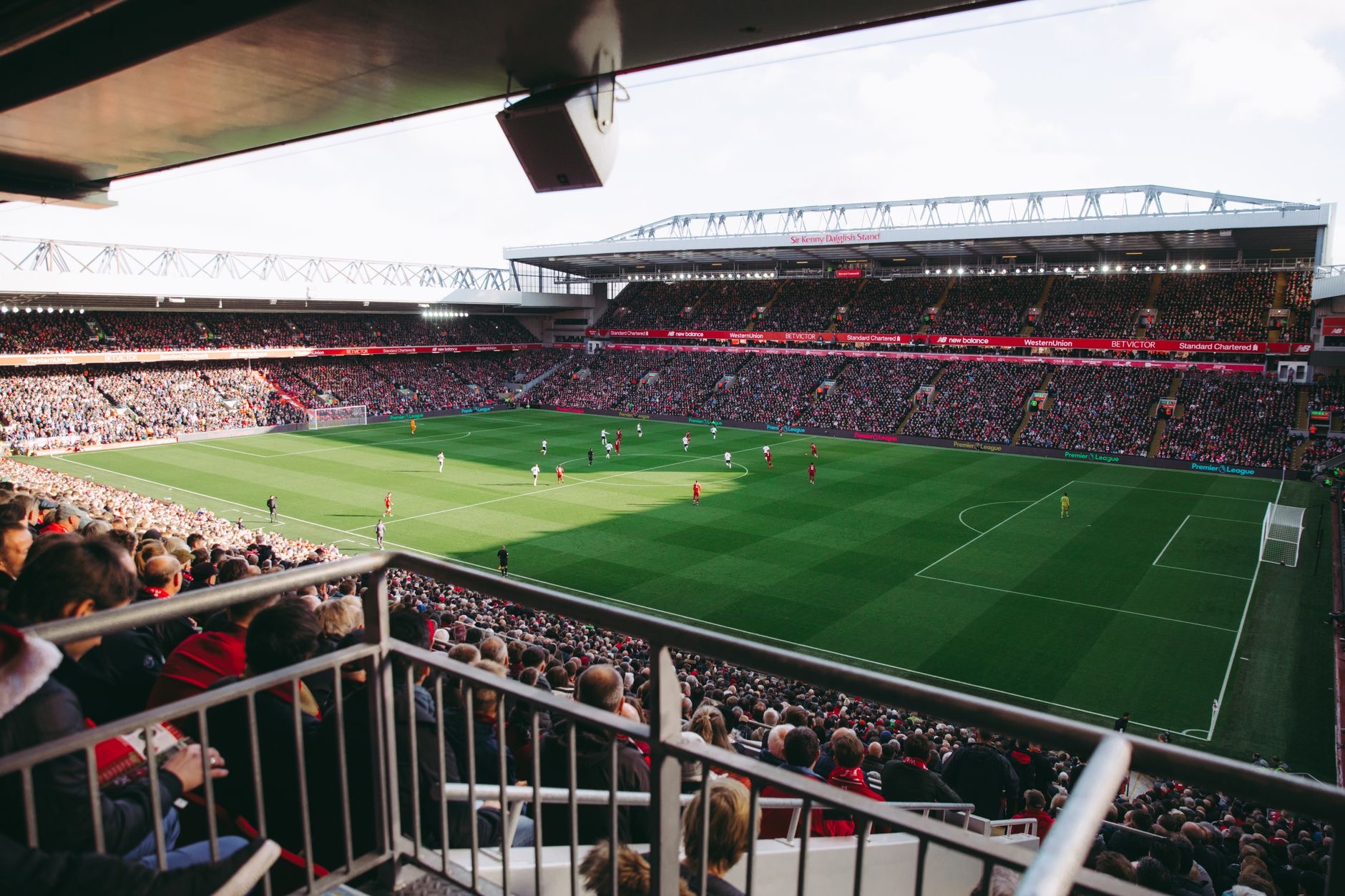 Fans use mobile sports tickets to enter a crowded U.S. stadium before a major professional game.