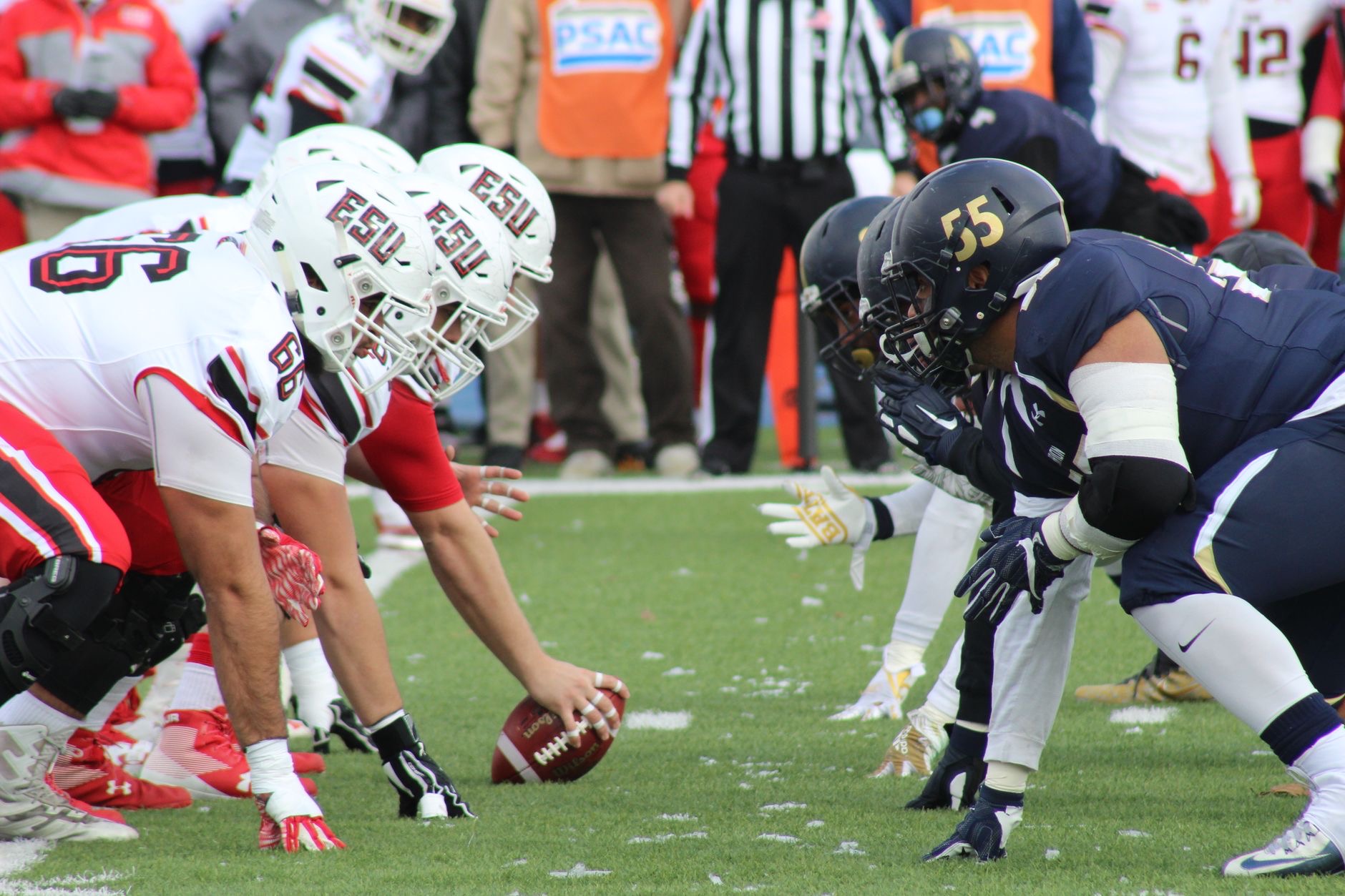NFL and college football players compete as changing eligibility rules fuel debate over movement between the professional and college games.