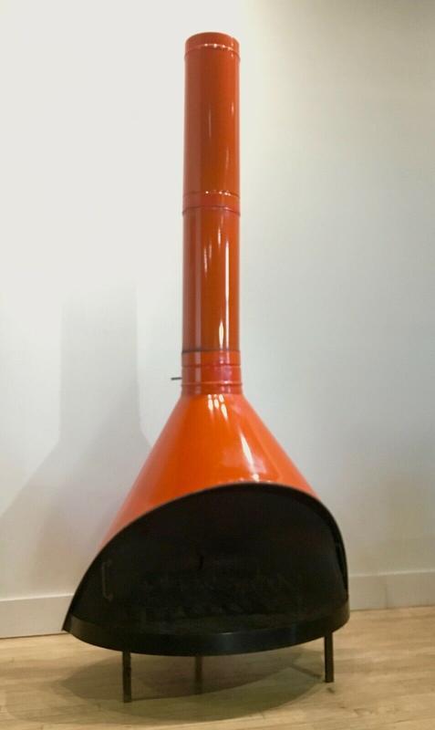 This Cone Shaped Black Steel Fireplace Design Sets A Contemporary Tone For The Room