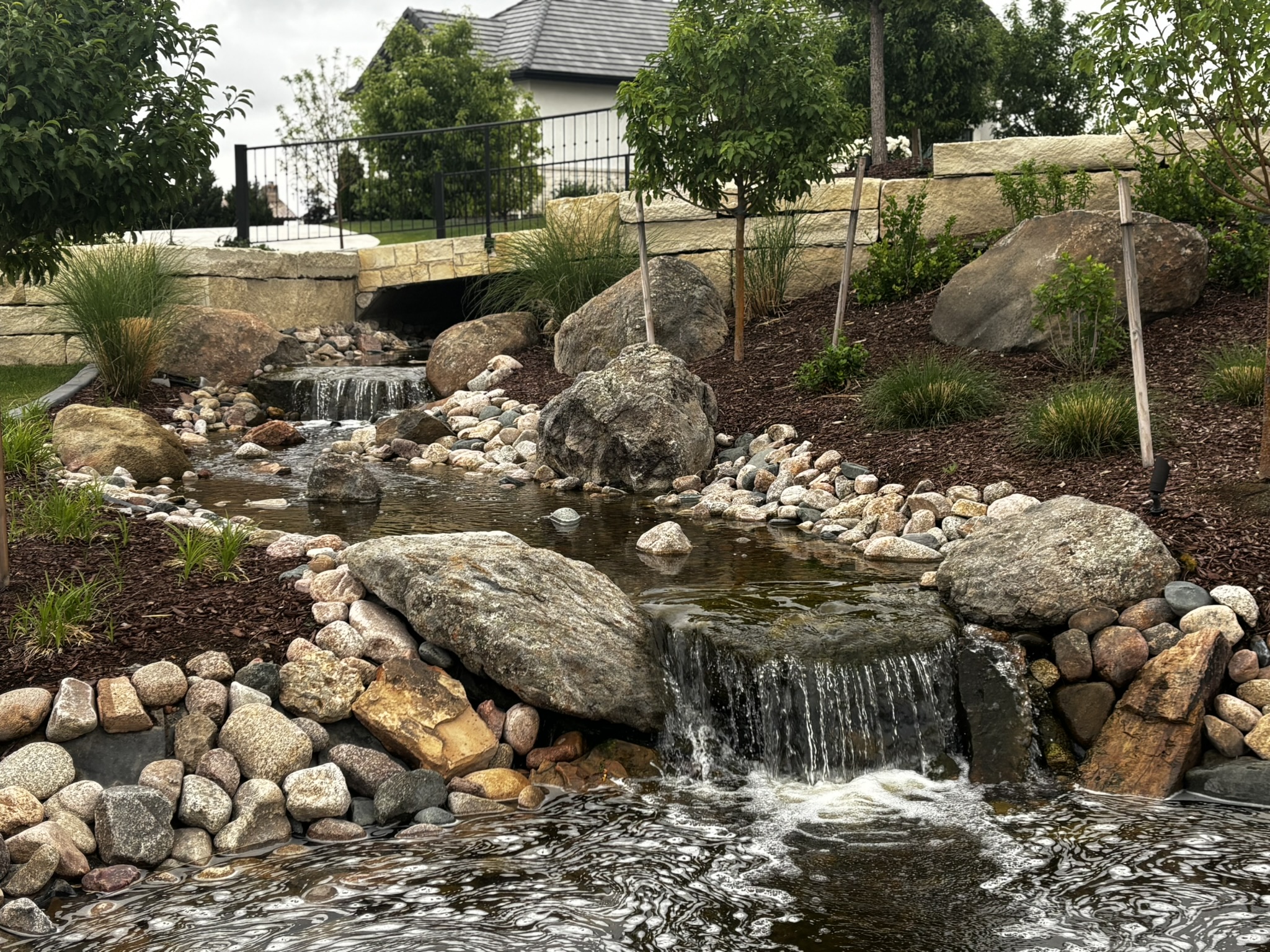 Photo of stream flowing into pond