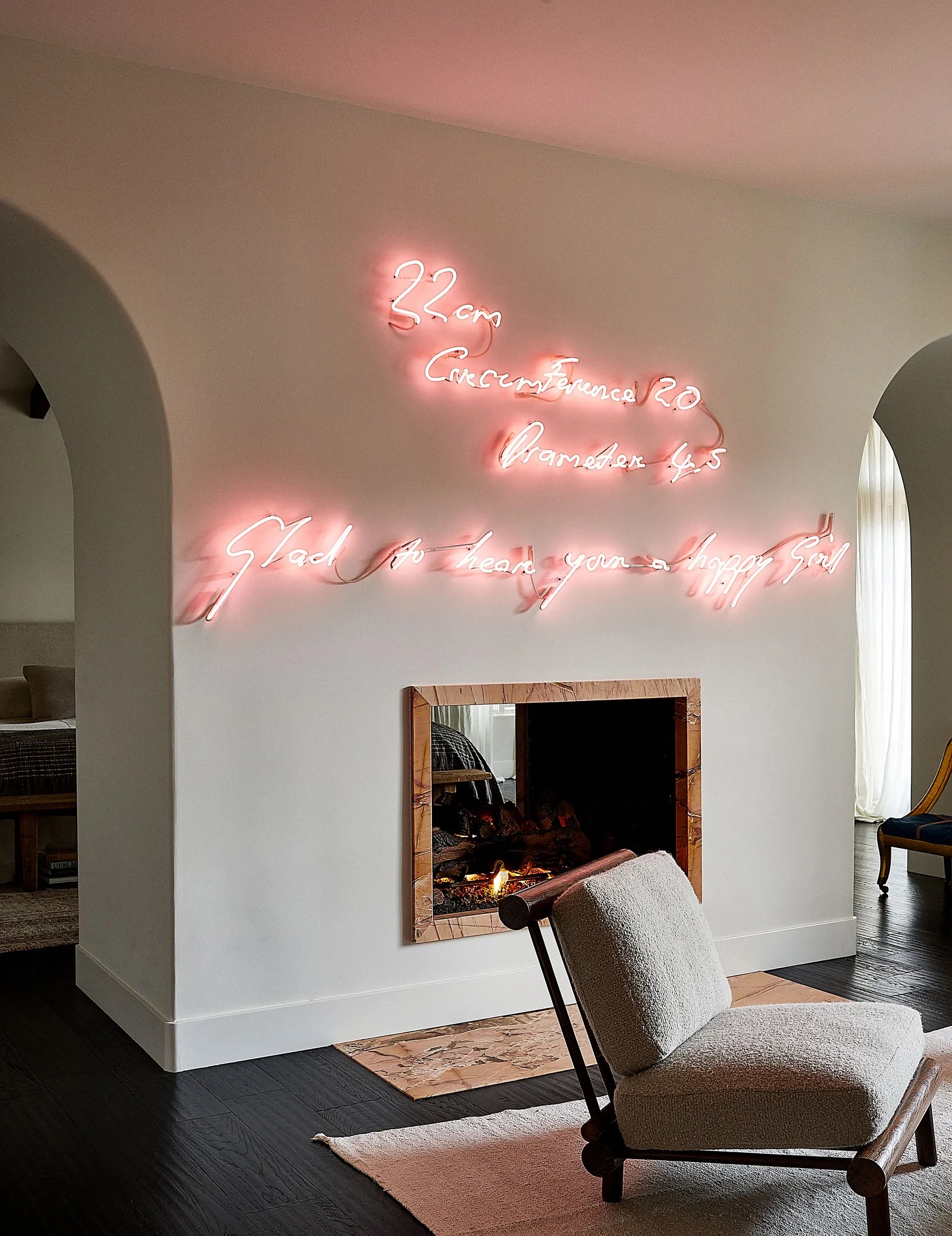 A Tracey Emin sculpture hangs in the bedroom sitting area.
