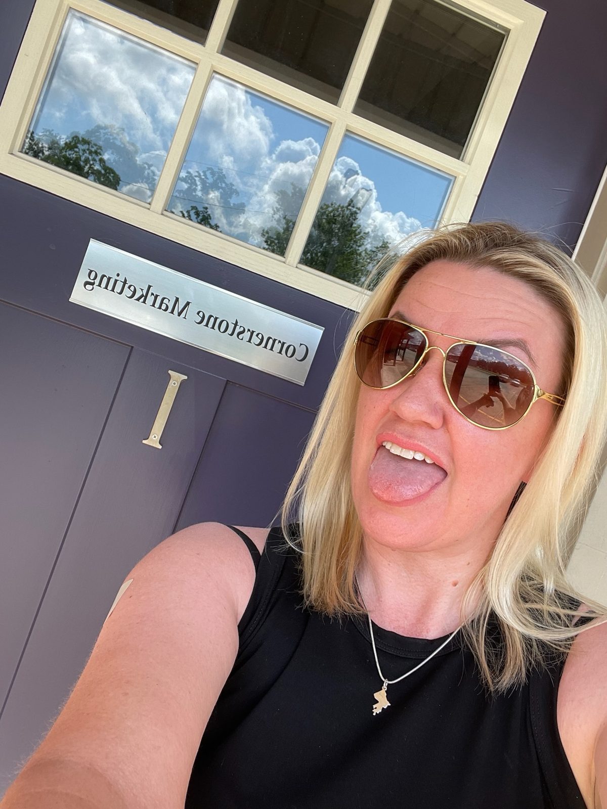 Tabitha Starkey outside the Cornerstone Marketing office