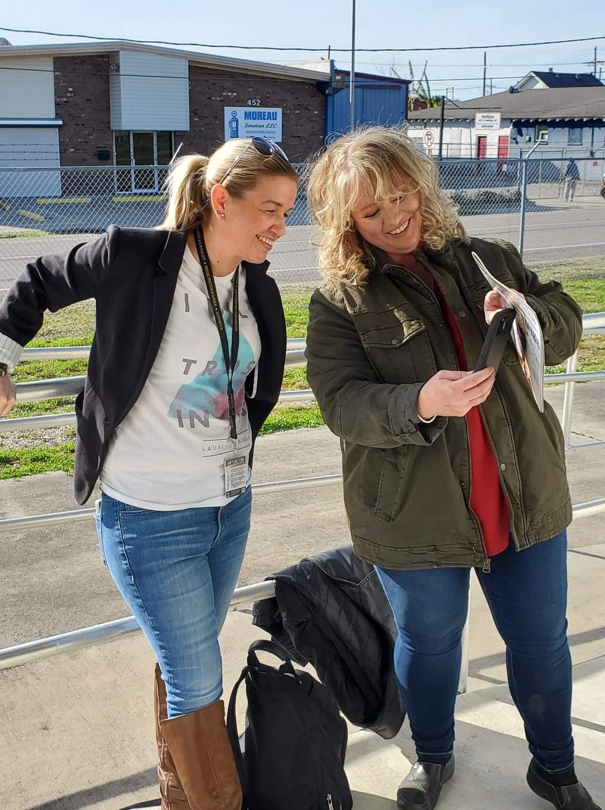Tabitha Starkey with press credentials on assignment