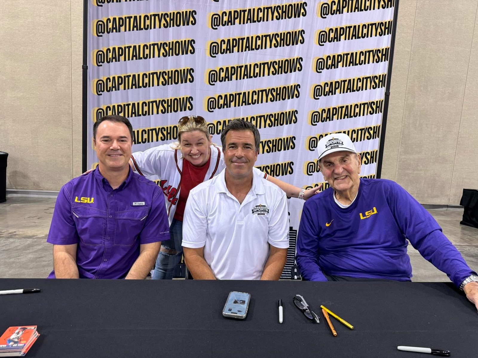 Tabitha Starkey with LSU baseball legends Warren Morris, Todd Walker, and Coach Skip Bertman at the Capital City Cards and Collectibles Show