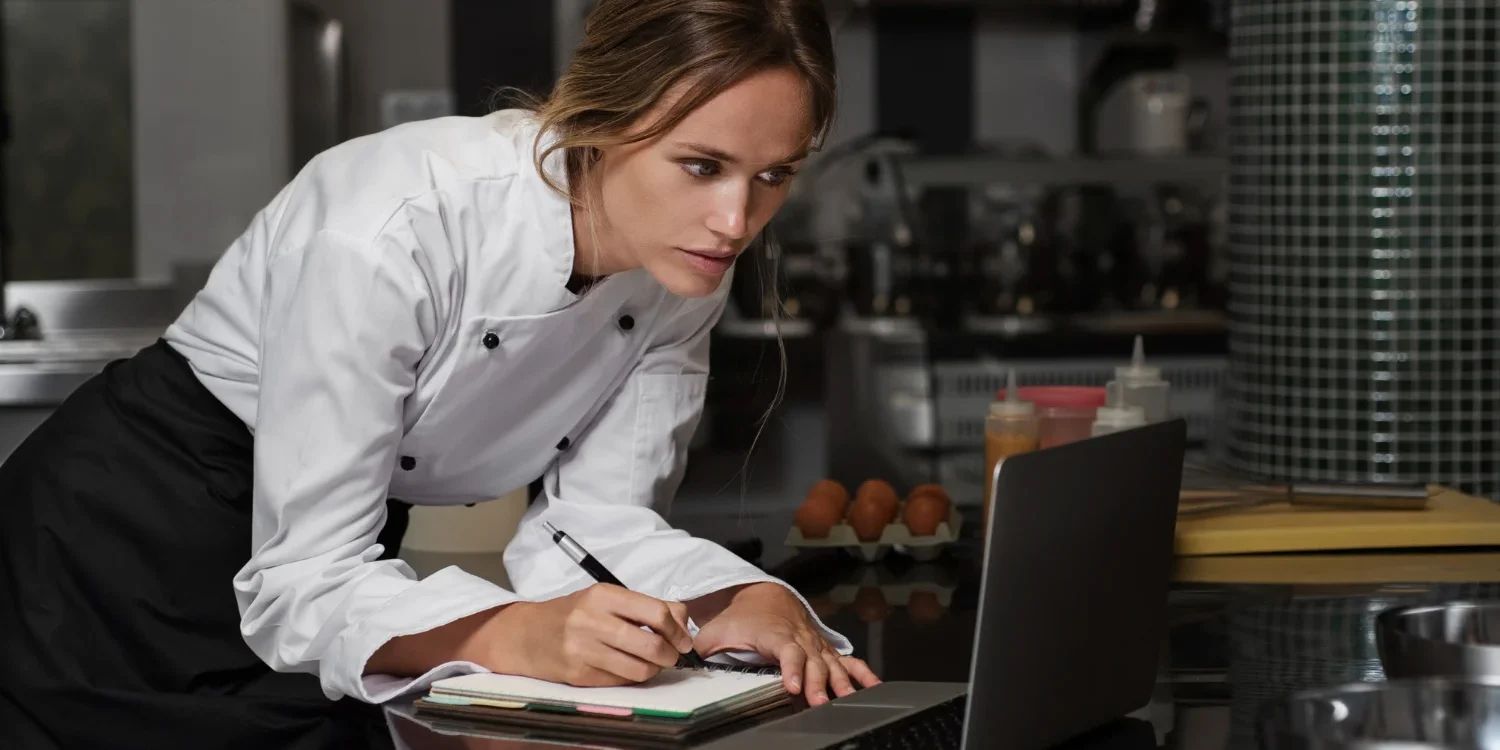 Staff checking restaurant analytics