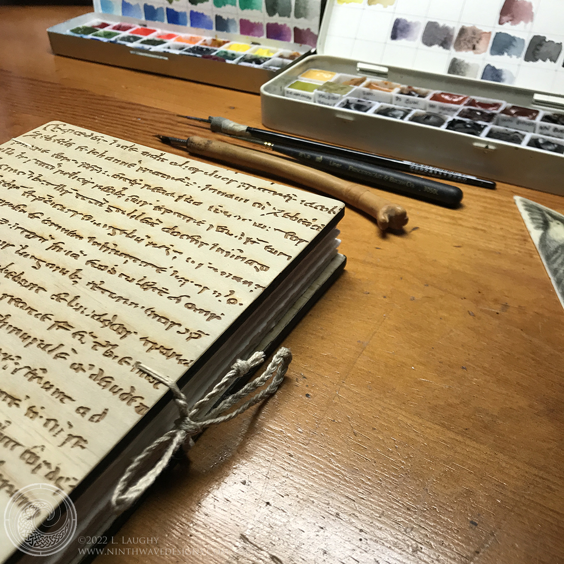 Modern Scribe: Ties keep the book closed, made using 140lb Arches watercolor paper.