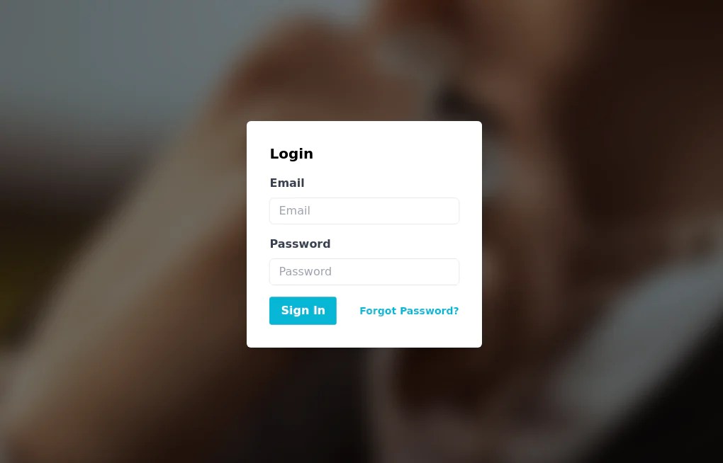 Login Form With Blured Background Image - Tailwind CSS Example