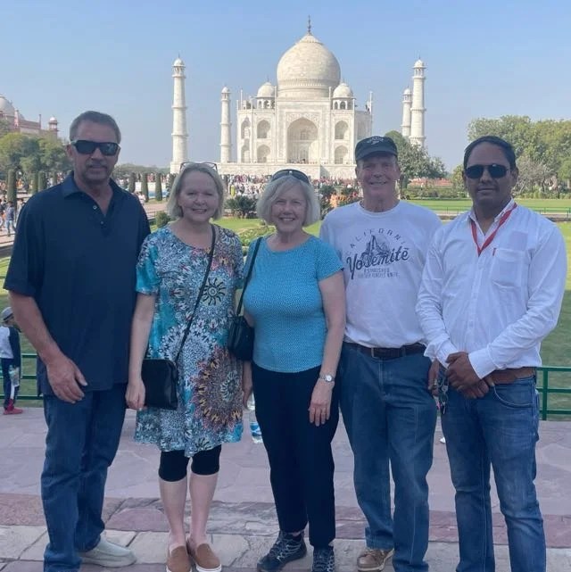 Tourist with guide at Taj Mahal during Agra to Jaipur Private Transfer with Taj Mahal & Agra Fort Sightseeing