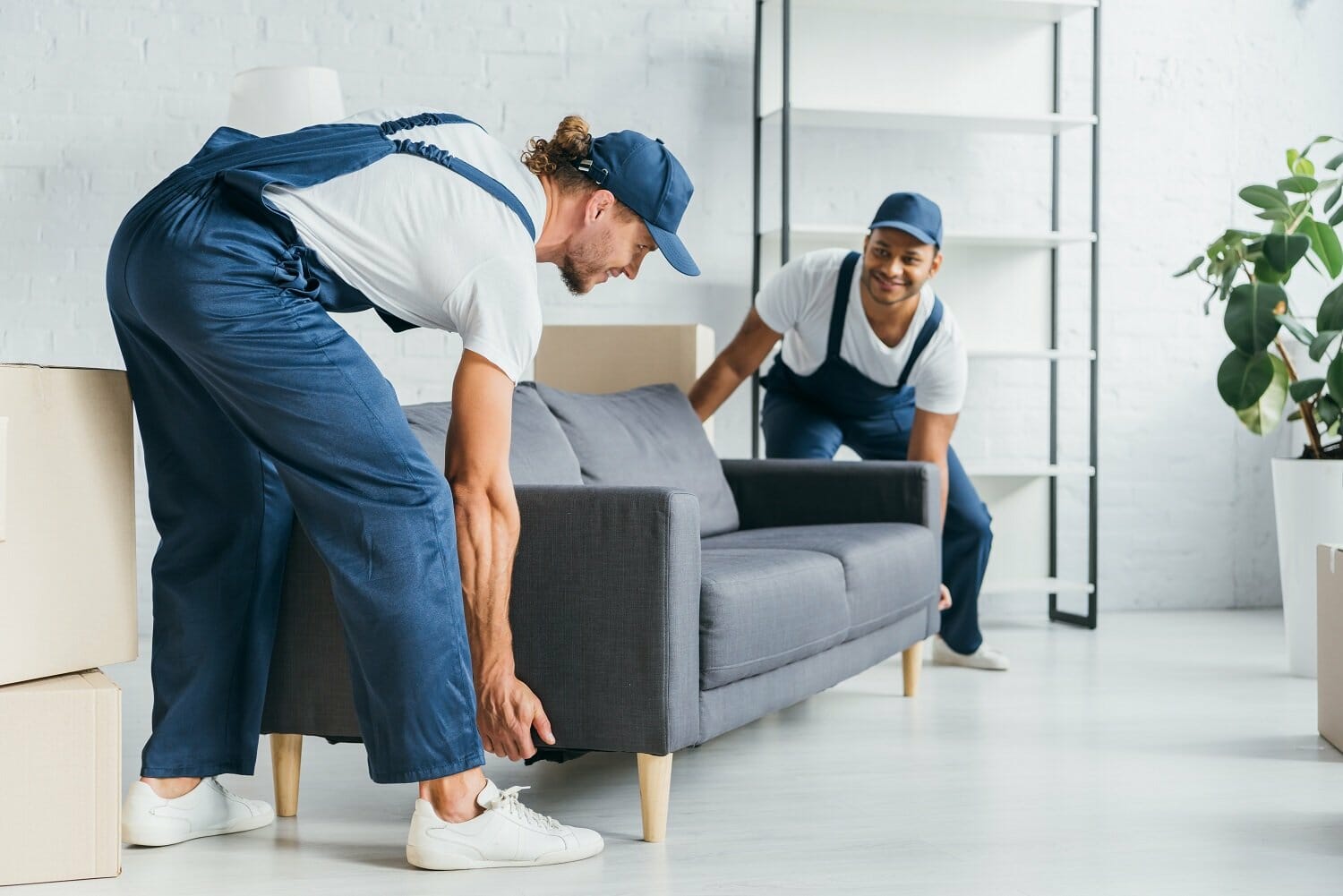 Movers picking up a couch