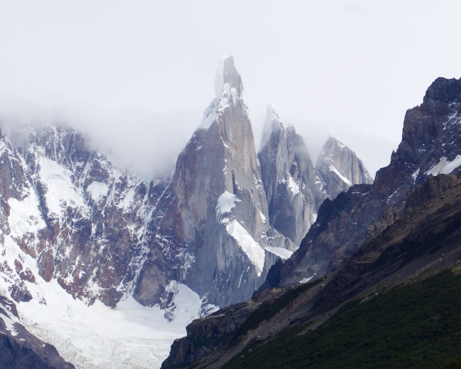 The haunting spires of Cerro Torre piercing the clouds