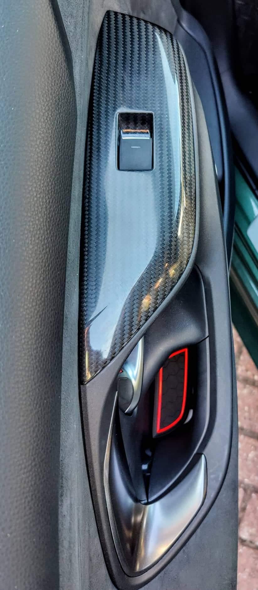 carbon fibre window switch panel at Tanso Design