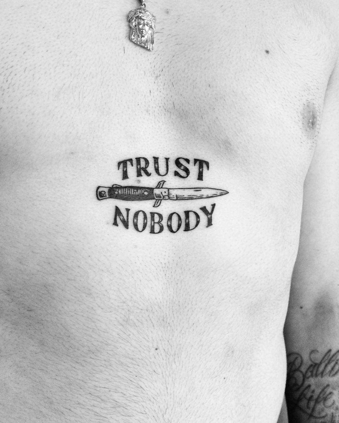 Trust Nobody Tattoo On The Sternum - Tattoogrid.net 1350_x_1080_jpg