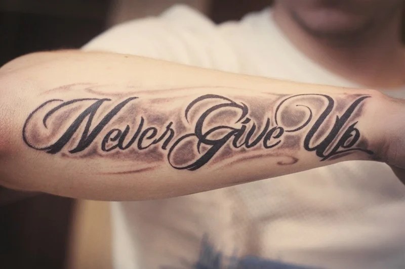 22 Superb Never Give Up Tattoo Design And Ideas