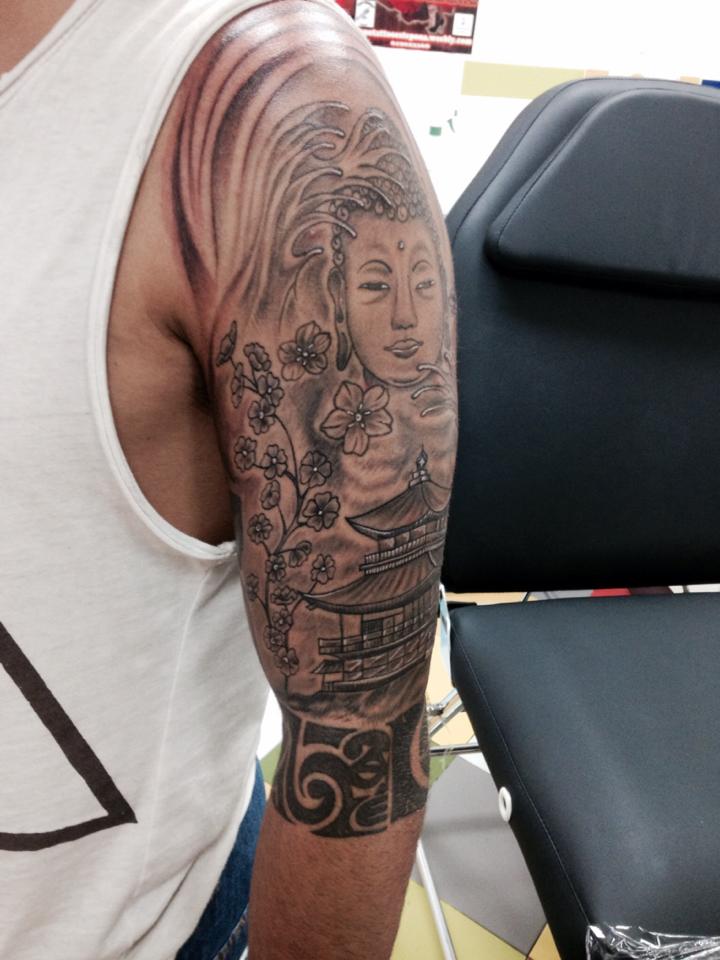 Gratis Scarica immagini Tatuaje De Un Paisaje Oriental Con Una Cara De Buda ultima da parte di