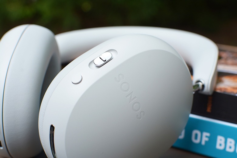 Sonos Ace Ultra over-ear headphones, Soft White colourway, shown in a lifestyle product shot