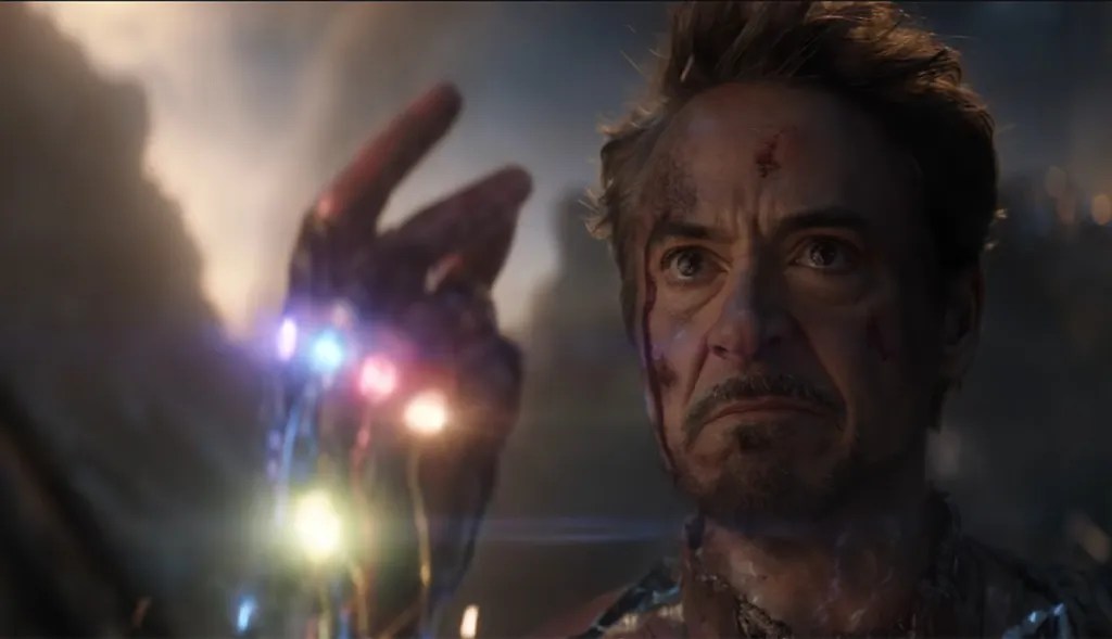 Tony Stark snapping with the Infinity Stones in the climactic battle of Avengers: Endgame