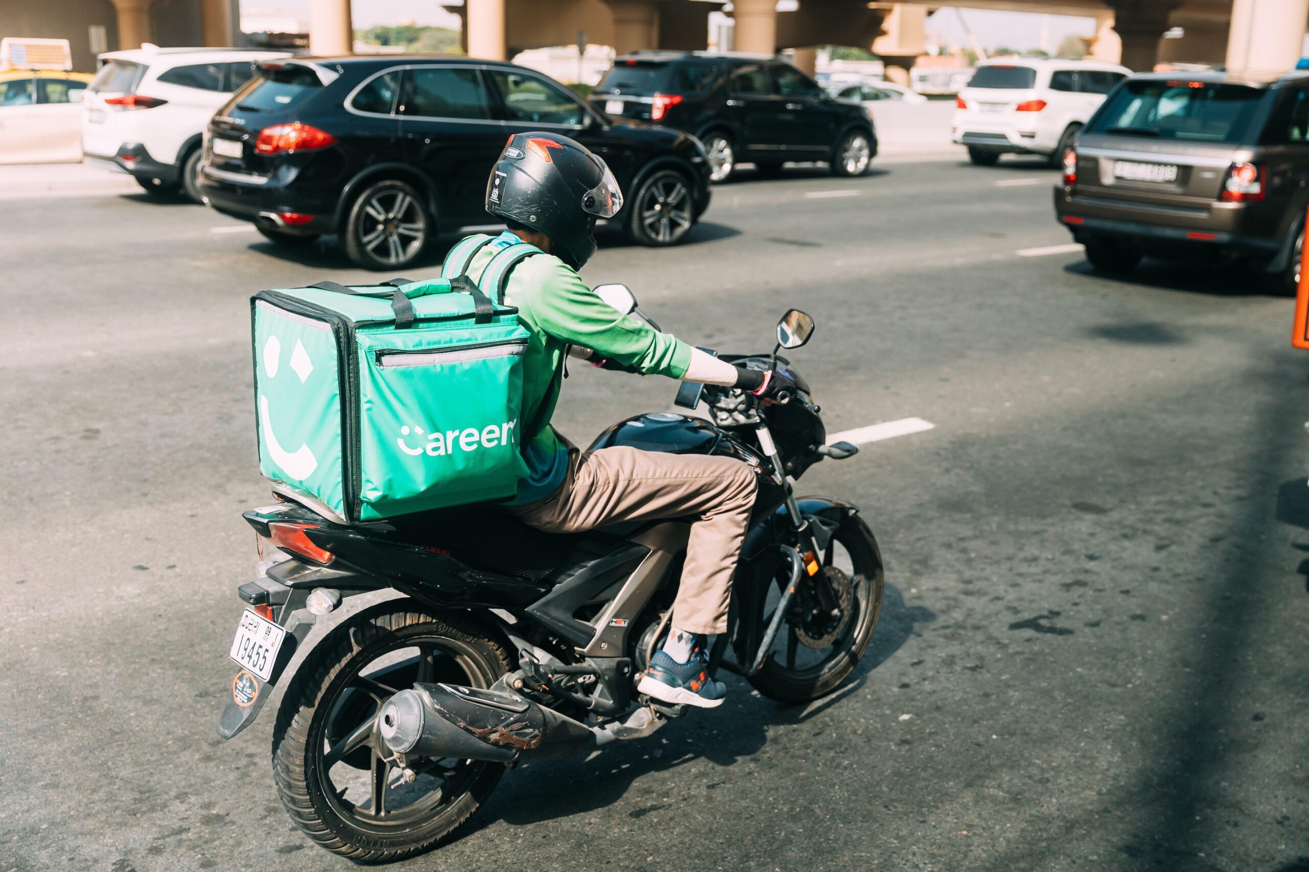 Careem super app on a phone, showing food delivery, payments and courier services