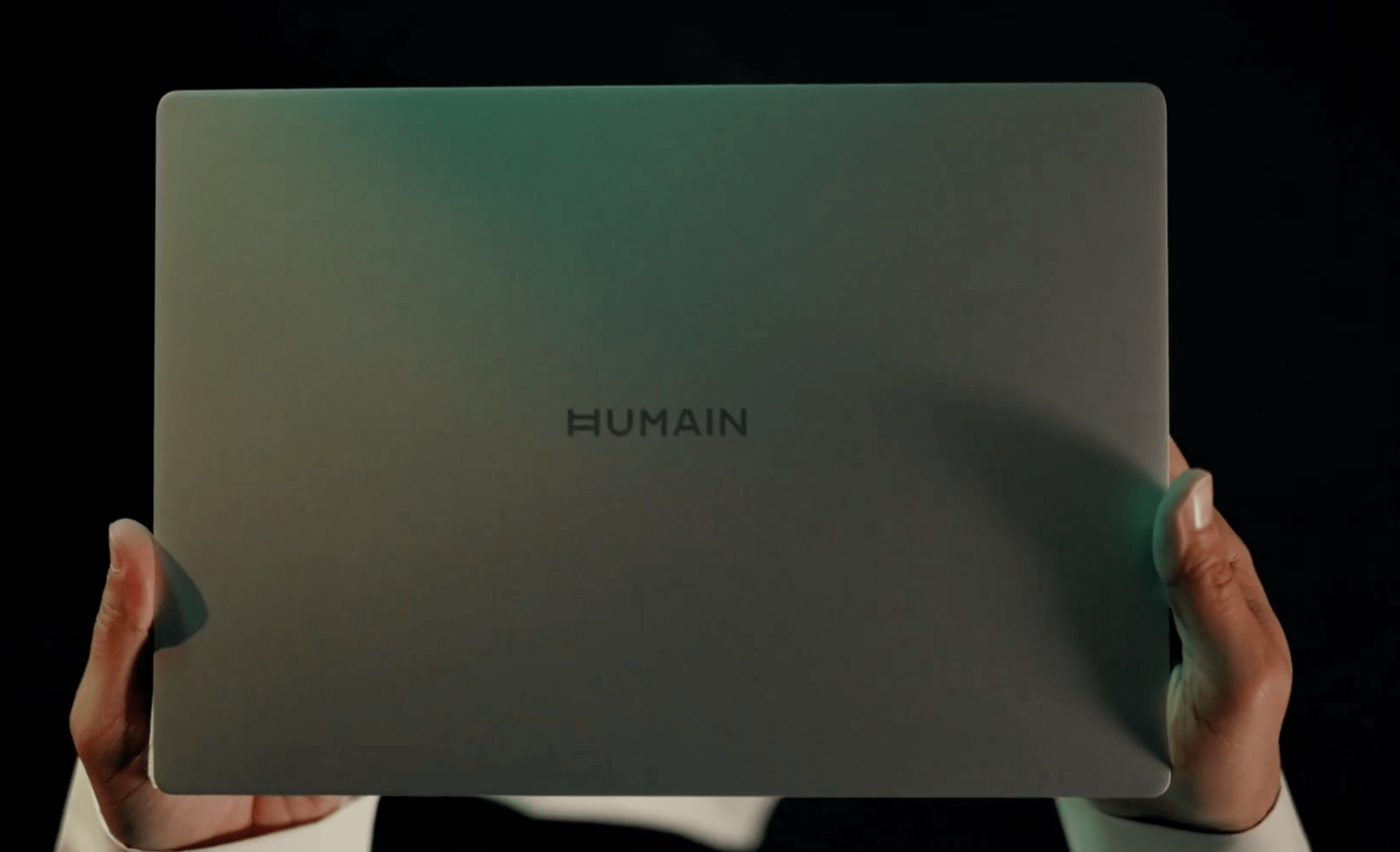 HUMAIN Horizon Ultra laptop with silver lid and HUMAIN branding in a teaser shot