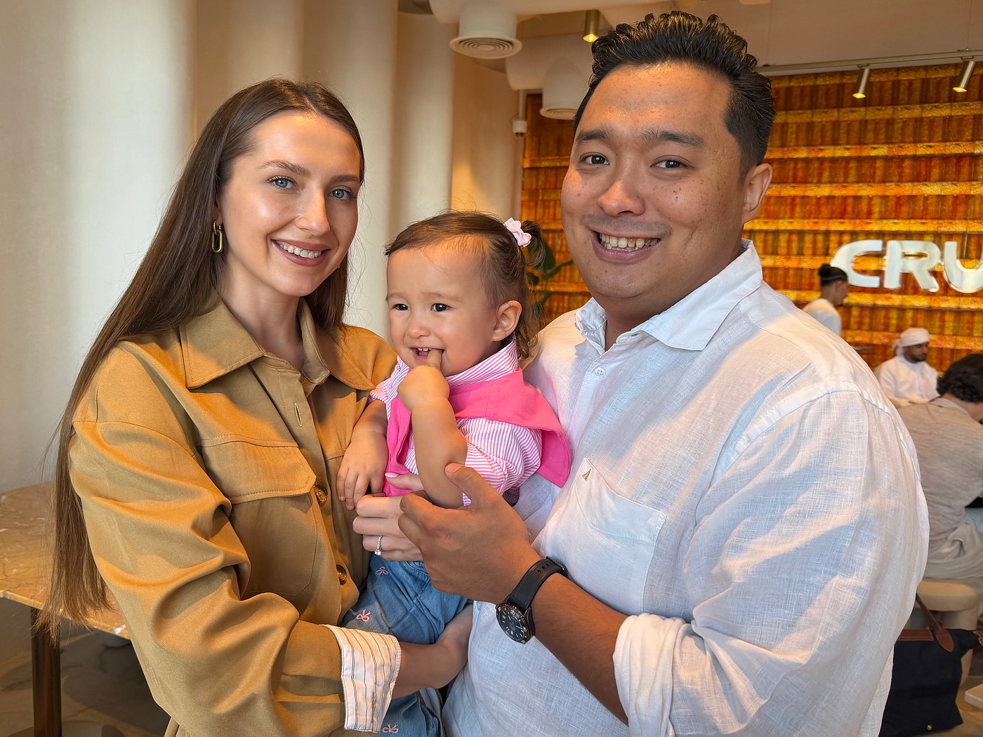 CRUNCH cafe Dubai founders Mukhtar Kosbayev and Anastassiya with daughter Aylin