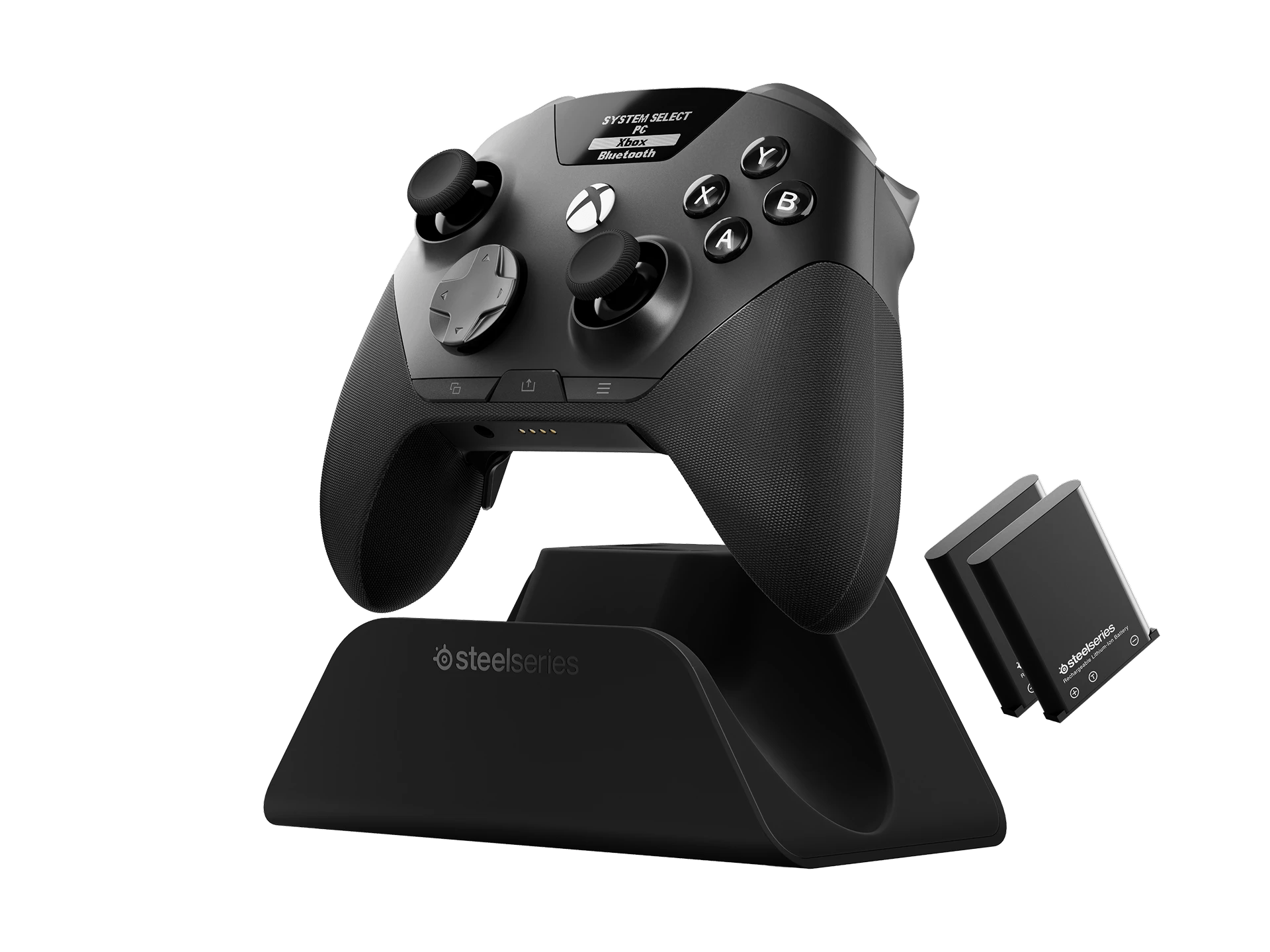 Black SteelSeries Aeon Pro controller with dock and spare batteries