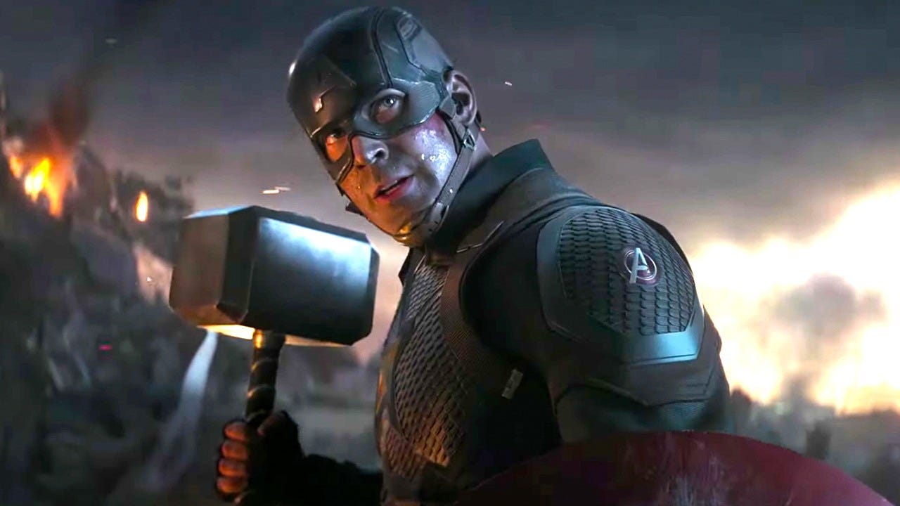 Steve Rogers holding Mjolnir in an Avengers Endgame battle still