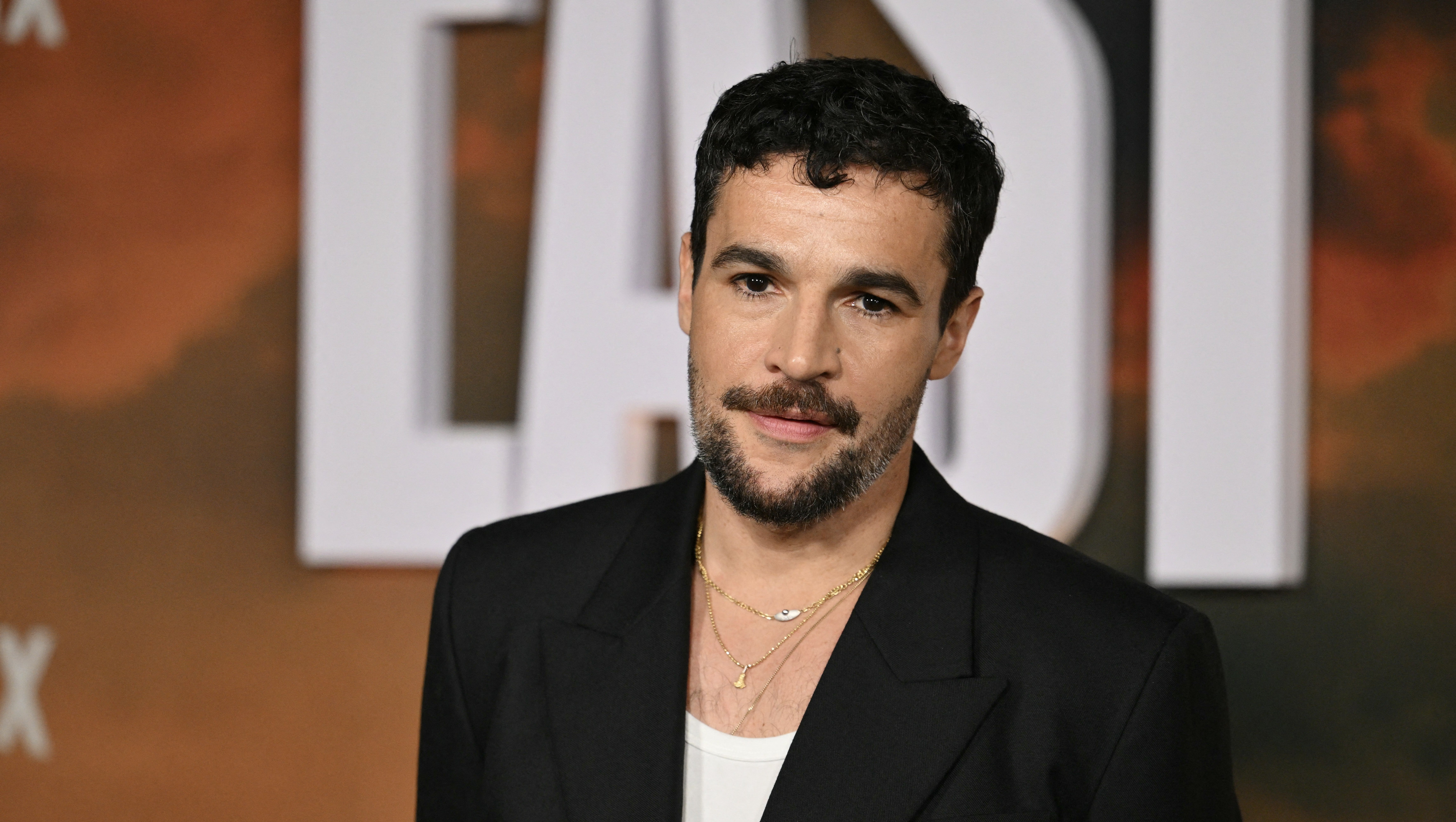 Christopher Abbott at an event photographed for IGN Kraven the Hunter report